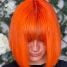Reflections Hair Group Competition work showing a bright copper bob